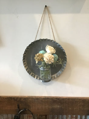 Wood flower with glass vase on vintage inspired pie plate